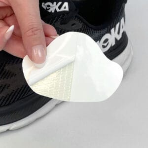 Reparer skoens hælkappe