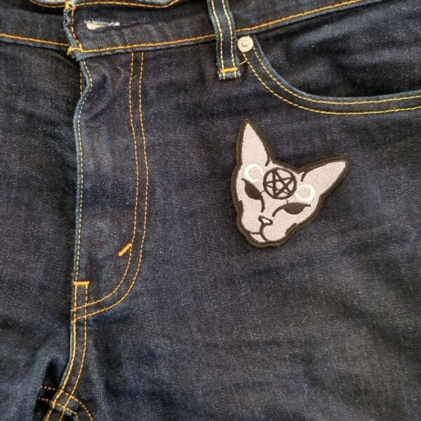 Mystisk katt Strykemerke bukser