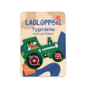 tygmärke grön traktor