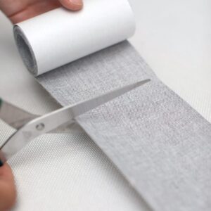 Selvheftende stoff med linstruktur